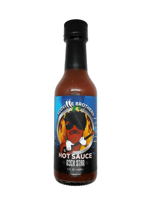 A bottle of hot sauce with a picture of a man on it.