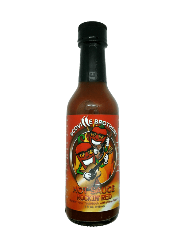 A bottle of hot sauce with the label " chili brothers "